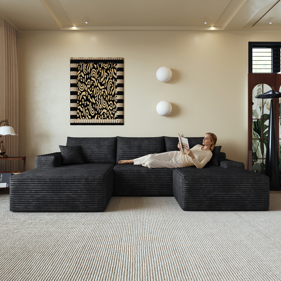 Sofá modular en l de tela negra con chaise longue sin montaje