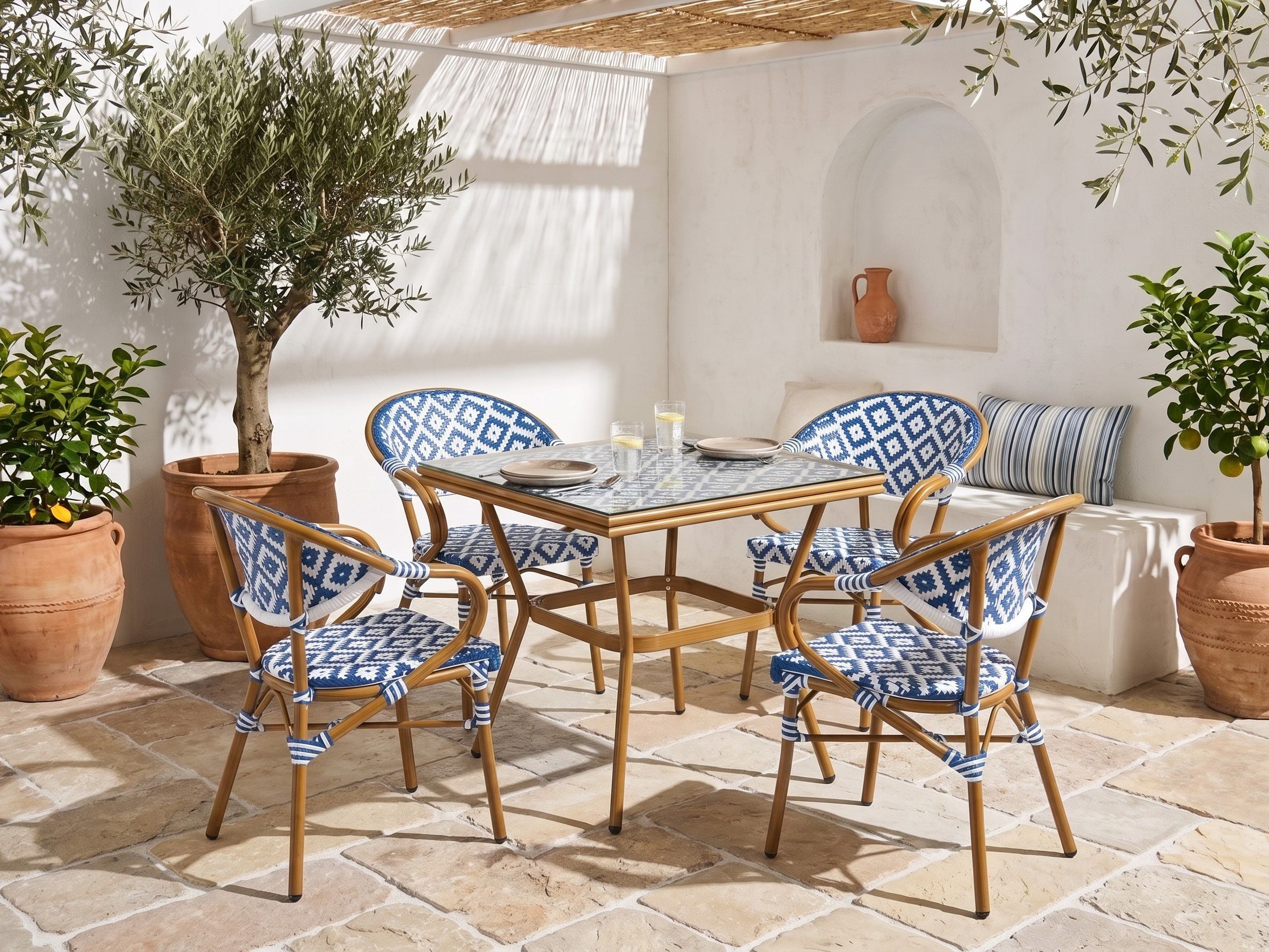 Conjunto de comedor exterior 4 plazas caspri ratán sintético azul/blanco