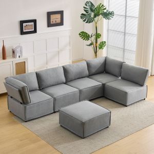 Sofá modular en l convertible a cama de tela gris claro