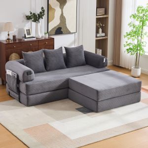 Sofá modular de pana gris oscuro con otomana y cojines
