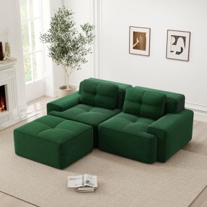 Sofá modular en l de pana verde con otomana y asiento profundo