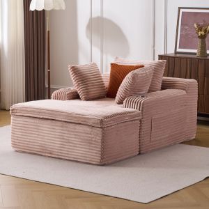 Sofá chaise longue plegable de pana rosa con cojines y manta