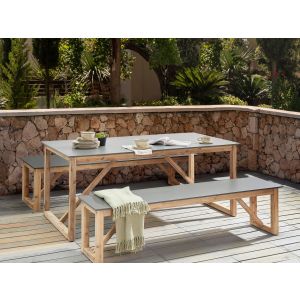 Conjunto de comedor exterior con bancos notteri cemento gris